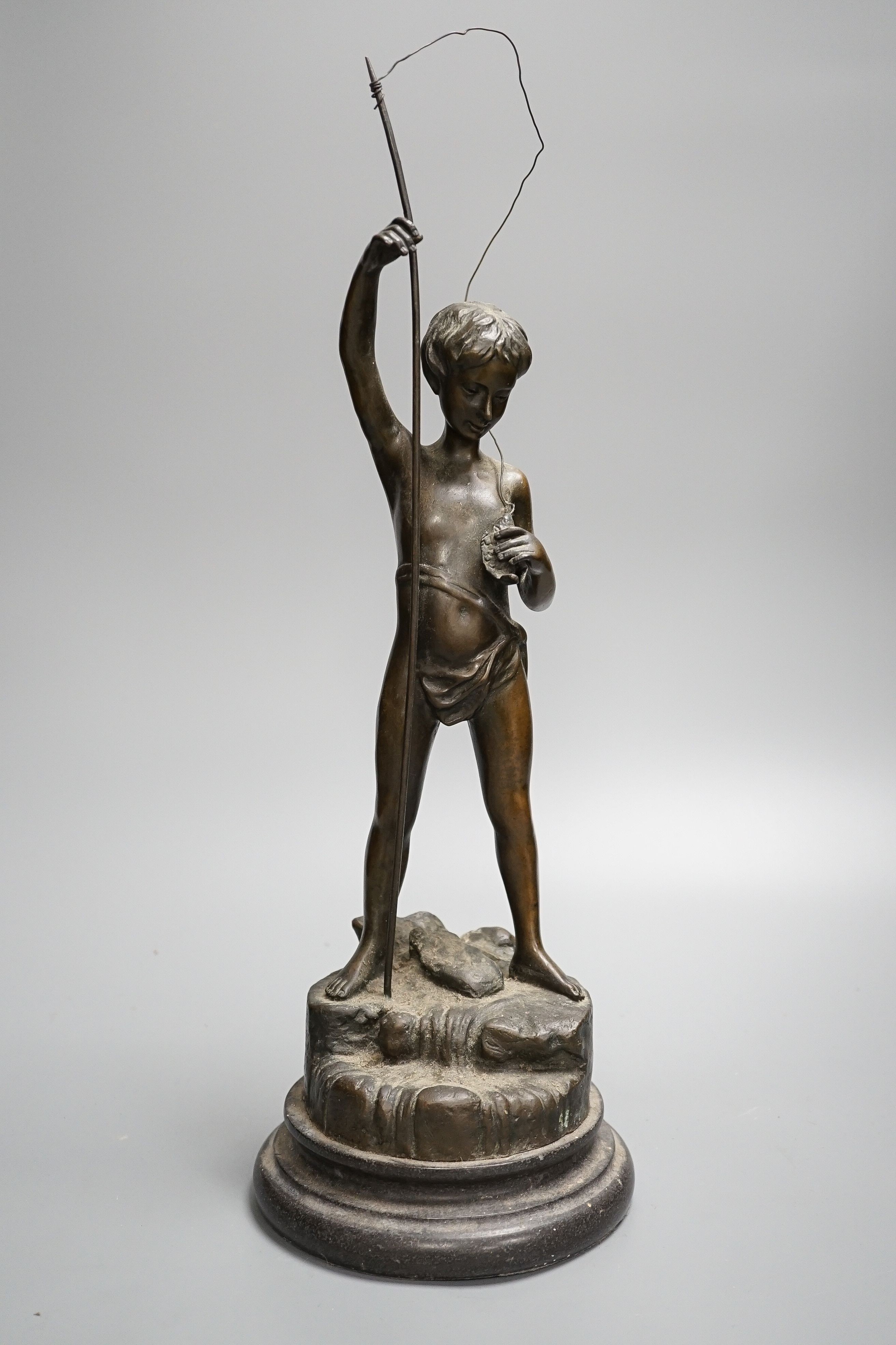 A bronze figure of a young fisherman, height 44cm
